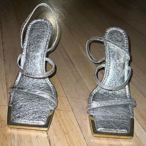 Silver square heeled with gold outline on toe area heels!